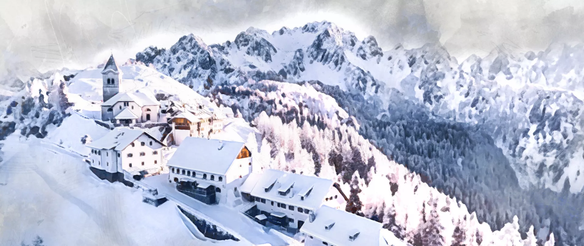 Dorf auf Bergrücken in den schneebedeckten Bergen 
